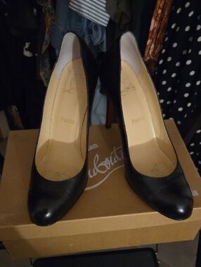 Christian Louboutin Black Leather Rounded-Toe Pumps with Red Soles